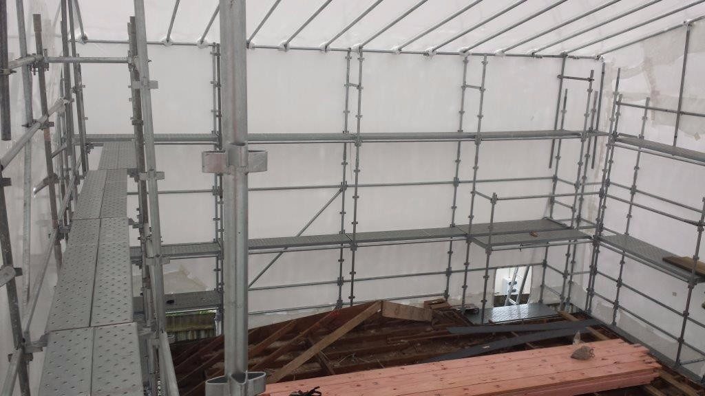 Heritage Façade — Full Shrinkwrap Containment